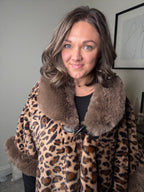 Leopard with the Fur Poncho DOORBUSTERS